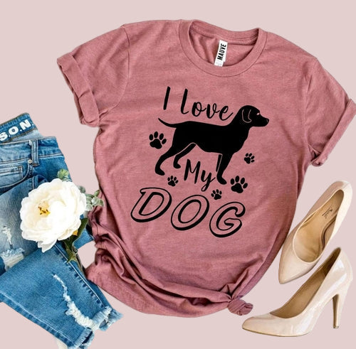 Mauve t-shirt with 'I love my dog' graphic, paired with jeans and high heels on a white background