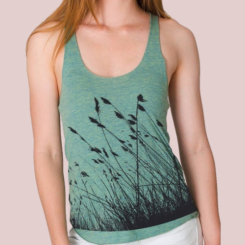 Green tank top with black silhouette design on a white background