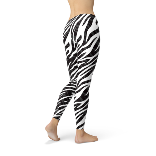 Zebra print leggings worn by a person on a white background