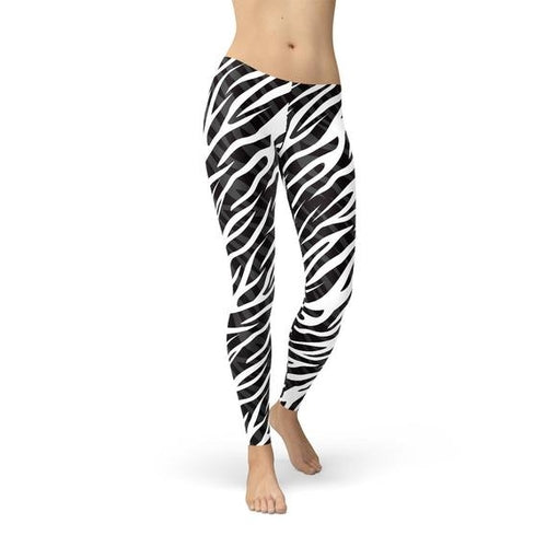 Zebra print leggings worn by a person on a white background