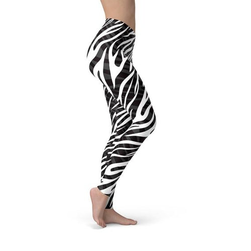 Zebra print leggings worn by a person on a white background